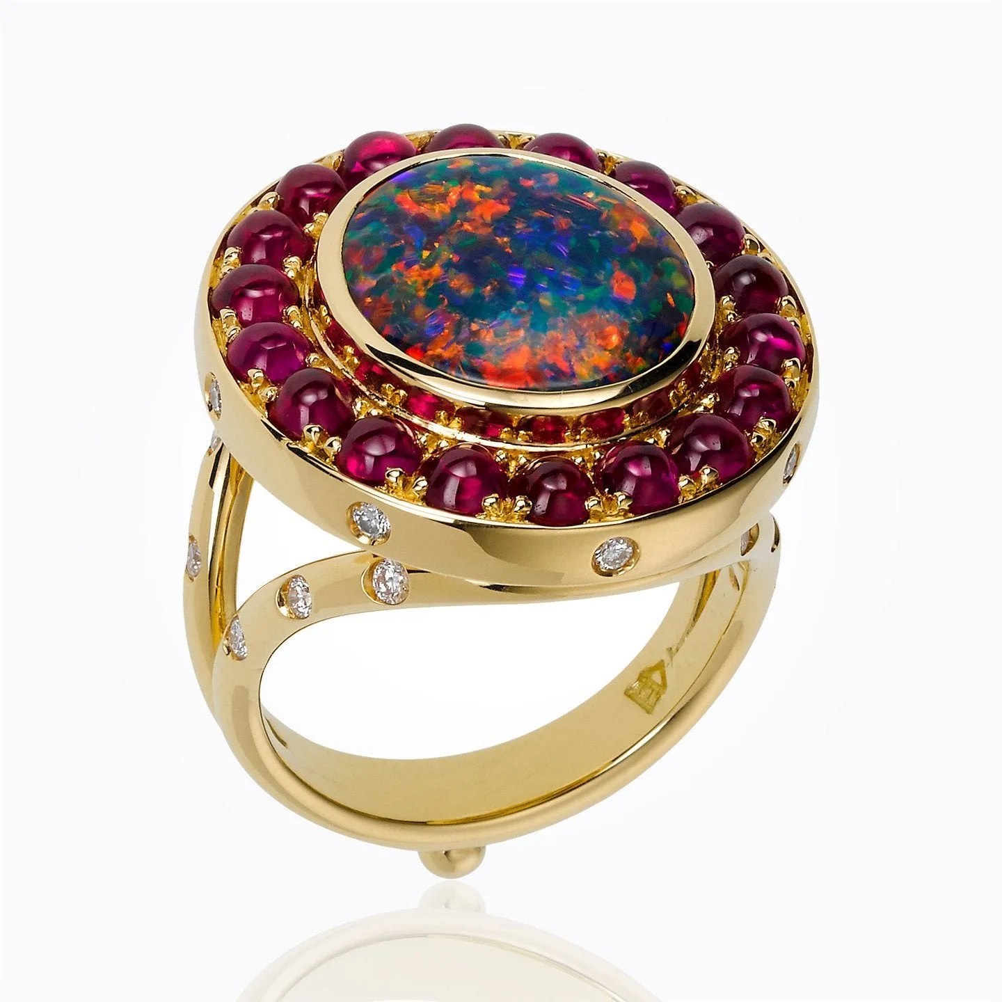 18K Halo Ring with Lightening Ridge black opal and ruby