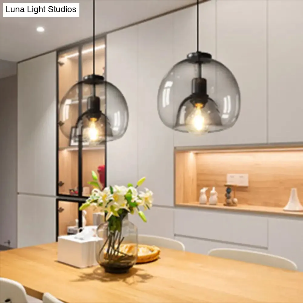 Minimalist Black Glass Pendant Light for Modern Dining Rooms